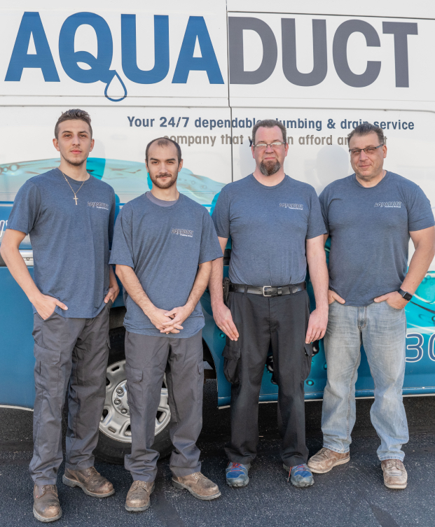 Staff in front of truck